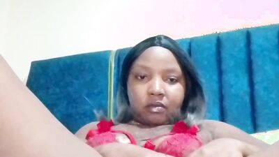 Extremely horny African mom cums so hard after playing with her wet holes.