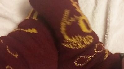 Putting lotion on my tiny, pale feet after showing them off in my favourite socks