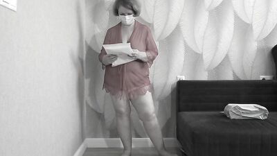 Mature BBW MILF tries on a nurse uniform.