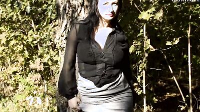 Kinky brunette MILF caught in the woods with her big tits and dildo - caught in stockings!