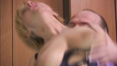 A petite blonde German woman with big breasts gets fucked in the locker room.