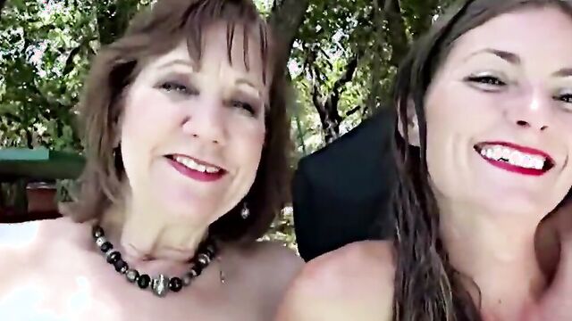 Mature lady and slutty MILF are having lesbian sex in the pool