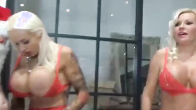 Inked blonde cougar is being gangbanged by a bunch of guys