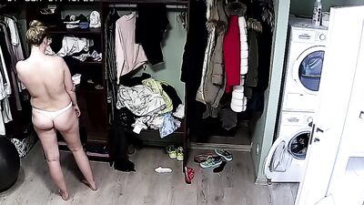 Spy cam catches this lovely mom as she changes her clothes