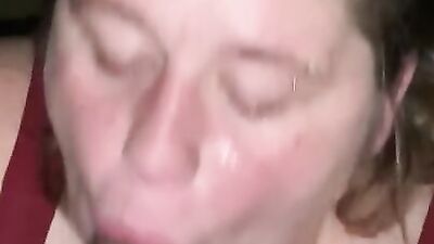 Fat mature woman is choking on a big black cock
