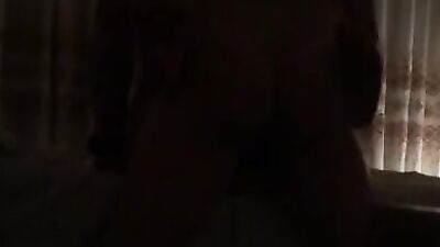 Amateur couple is filming their sexual activity in the dark room