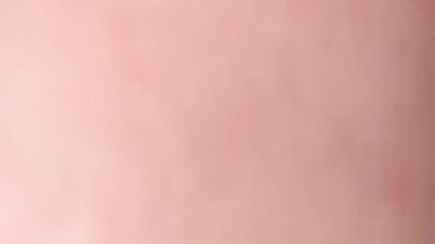 Blonde mom Paige Taylor stares at the camera while polishing that cock
