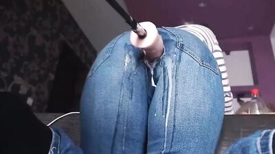 Fucking machine penetrates webcam girl thorough a hole on her jeans