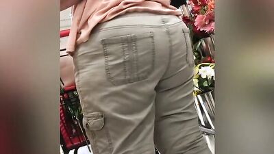 Creepy voyeur is following and filming this chubby mature woman