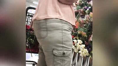 Creepy voyeur is following and filming this chubby mature woman