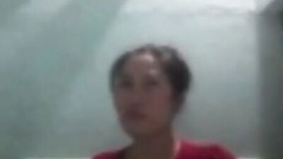 Horny Asian mom is playing with her pussy while taking a shower