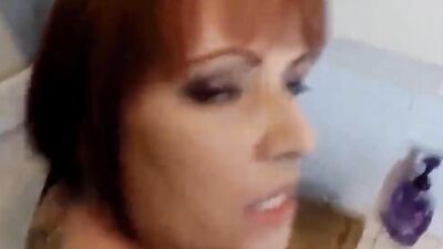 Redhead MILF Kylie Ireland goes down on a lucky cameraman