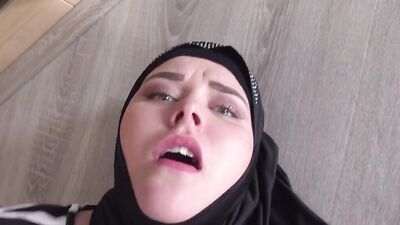 Hijab wearing MILF sucks a hard cock and then rides it