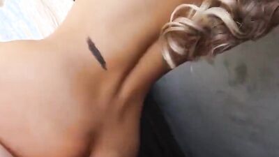Astonishing blonde MILF is havign sex with her man by the window