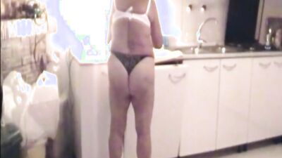 chubby mature woman poses in pants and shakes that big ass