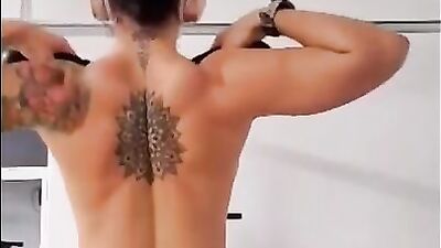 Busty MILF shakes big tits and cock-teases in the gym