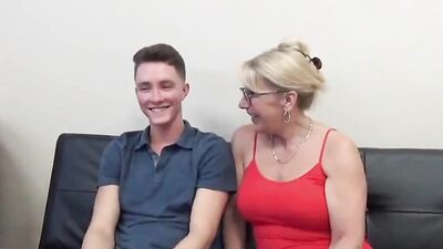 Busty mature woman strokes stepson's hard dick and rides it