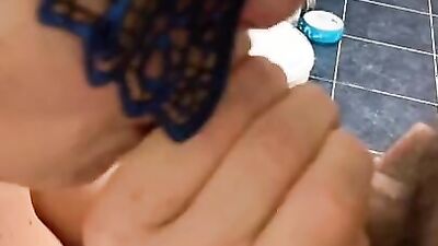 Kinky mature woman pisses in the toilet and sucks some cock