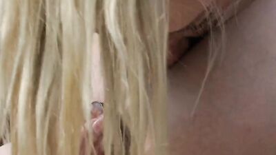 Lilu Moon and Adira Allure are making out on a house porch