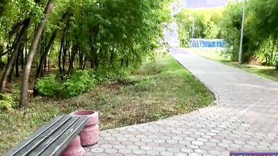 Busty MILF is filmed while flashing and cock-teasing in the park