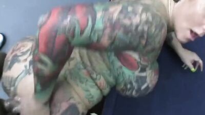 Slutty tattooed MILF is having some wild sex on the camera