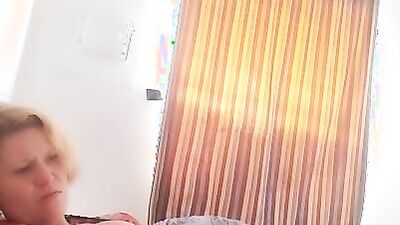 Mature woman gives some jerk off instructions and plays with herself