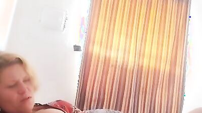 Mature woman gives some jerk off instructions and plays with herself