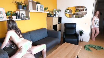 Nerdy girl watches as her sister gets fucked on the couch