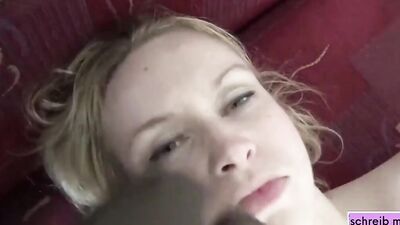 Blonde woman is filmed by black man while getting his cock