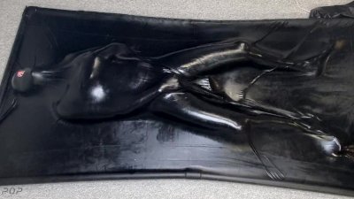 Helpless MILF in latex is being stimulated with a Hitachi magic wand