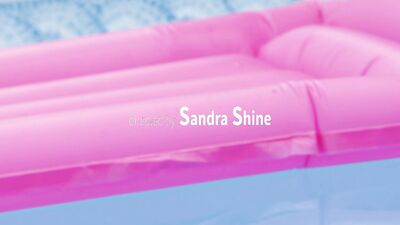 Lovita Fate and Sandra Shine are making out by the pool
