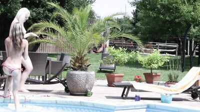 Lovita Fate and Sandra Shine are making out by the pool
