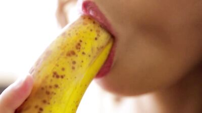 Depraved MILF Ariel Rebel is stimulating her pussy with a banana