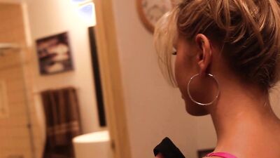 Astonishing blonde cougar is filmed while trying on different clothes