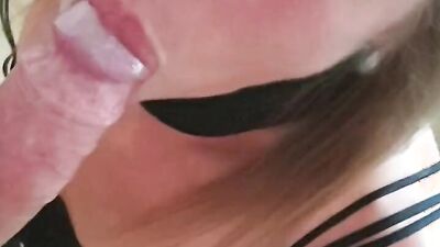 Bound girl kneels down on her master and sucks his hard cock