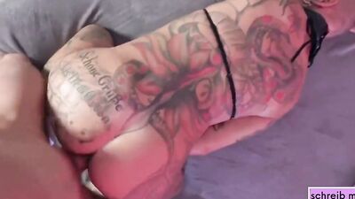 Bald inked woman sucks a massive cock and takes a wild plowing