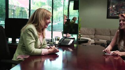 Depraved secretaries Nina Hartley & Pepper Kester are licking in the office