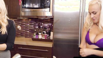 MILF and her stepdaughter are being naughty in the kitchen