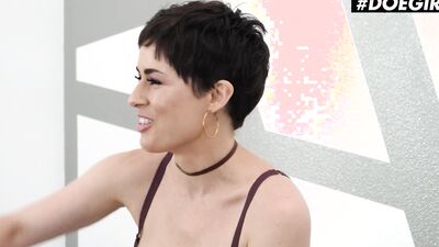 Short-haired MILF Olive Glass is playing with a sex toy