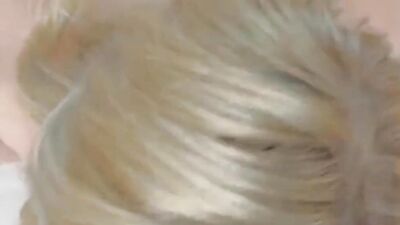 Close-up video shows a horny blonde taking cock up the asshole