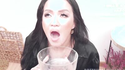 Cum-thirsty brunette swallows a lot of spunk at this blowbang party