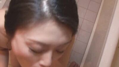 Asian MILS goes down on her stepson and sucks his pecker