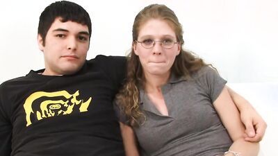 NErdy MILF is spanked while jumping on that big black cock