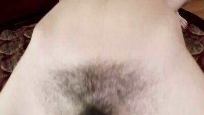 Dirty MILF gets naked and spreads legs to show that hairy pussy