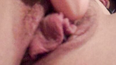 Horny girl is filming her wet pussy from up close while masturbating