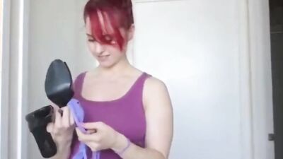Muscled redhead MILF dances for the camera and gets naked