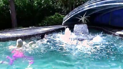 Jenny Simons and Lucy Li are sharing sex toy by the pool