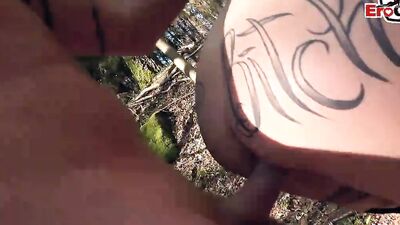 Chubby MILF is filmed while sucking a cock in the open air