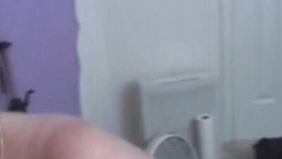 Amateur MILF is filmed from up close while polishing that knob