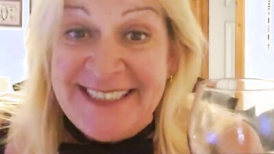 Naughty mature woman talks dirty while playing with her wet cunt